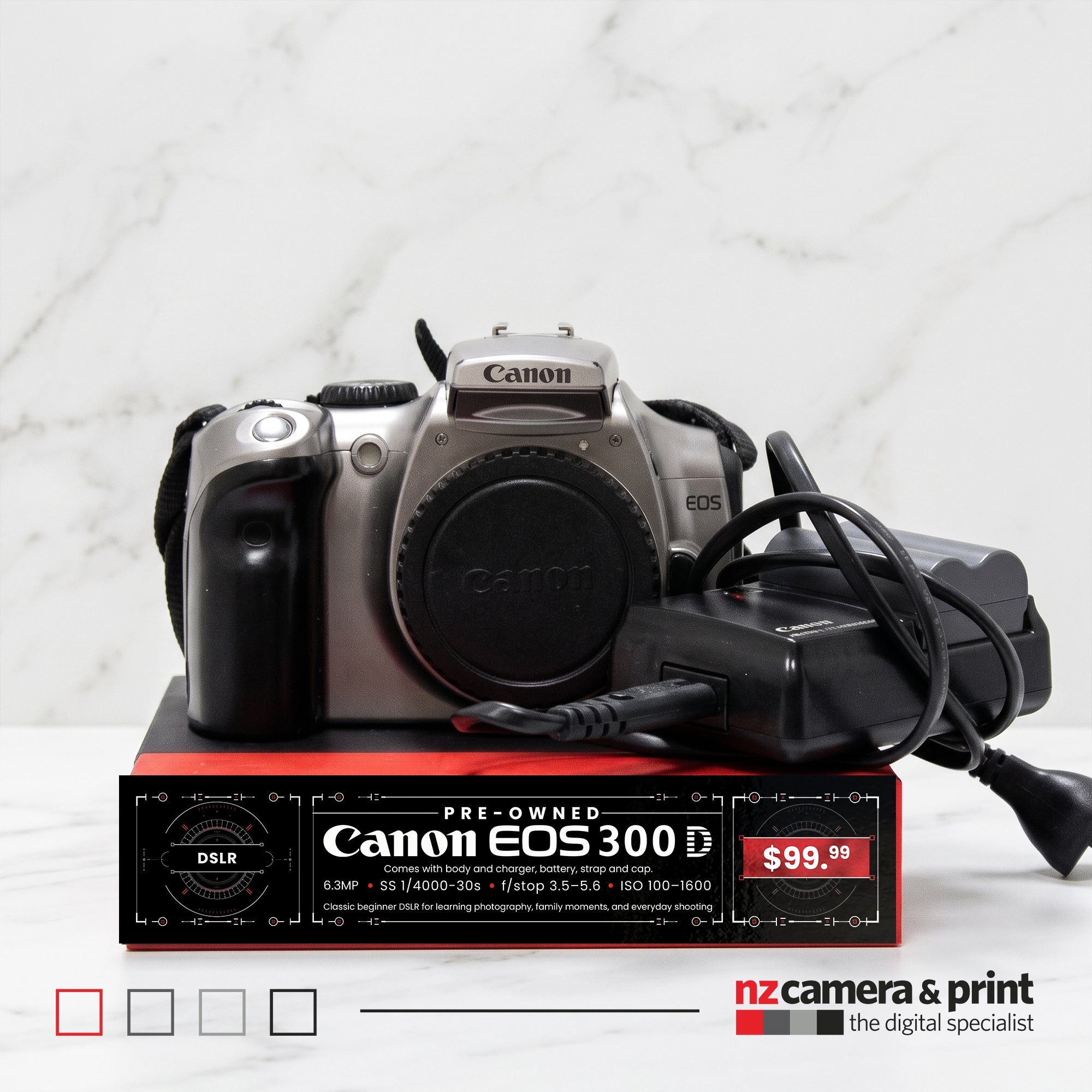 Pre-Owned Canon EOS 300D (Body Only) with charger, battery, strap and cap.
