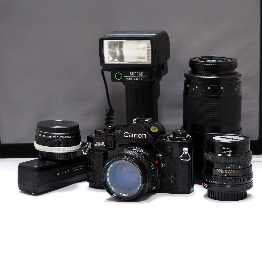Pre-Owned) Canon A1 Body with Lenses, Teleconverter plus