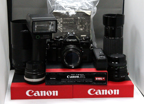 (Pre-Owned) Canon A1 Body with Lenses, Teleconverter plus Accessories