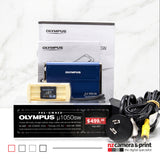 Pre-Owned Olympus Stylus 1050SW Blue Digital Camera Bundle