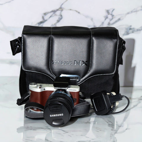 Pre-Owned Samsung NX300 with 18-55mm Lens Kit, Battery Charger and Strap